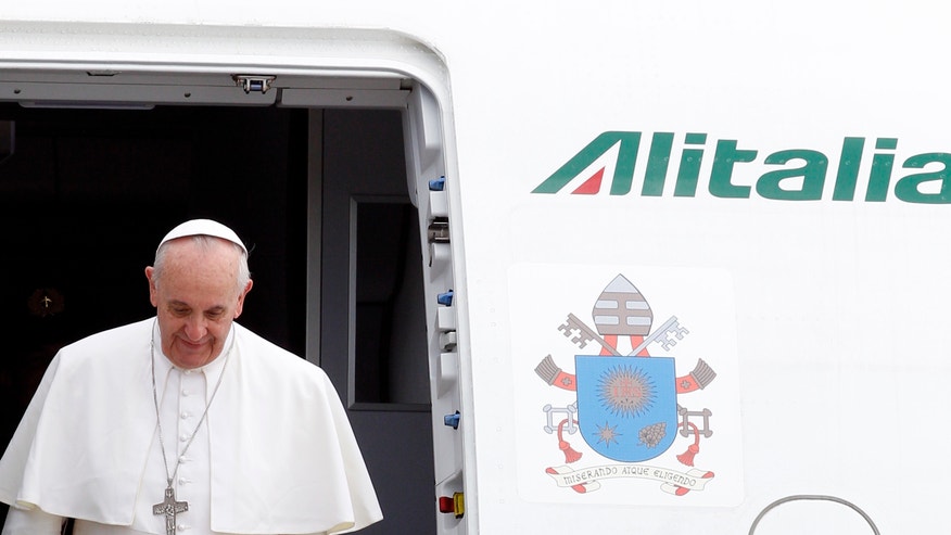 Italy Pope exiting plane july 29.JPG